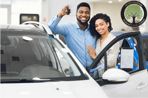 couple with new car keys